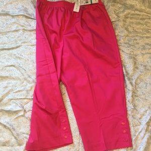 Bright raspberry capris with pink button on leg
